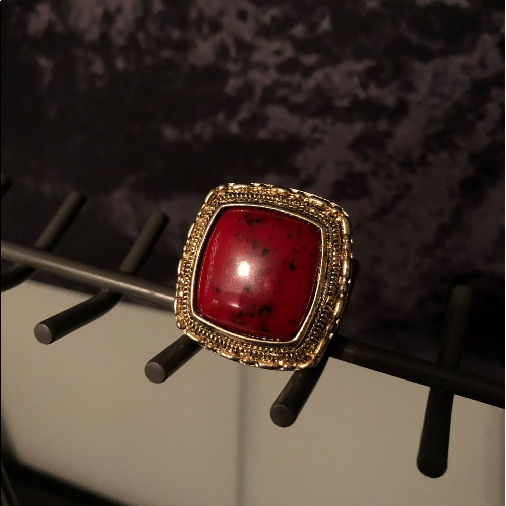 large deep red gem ring